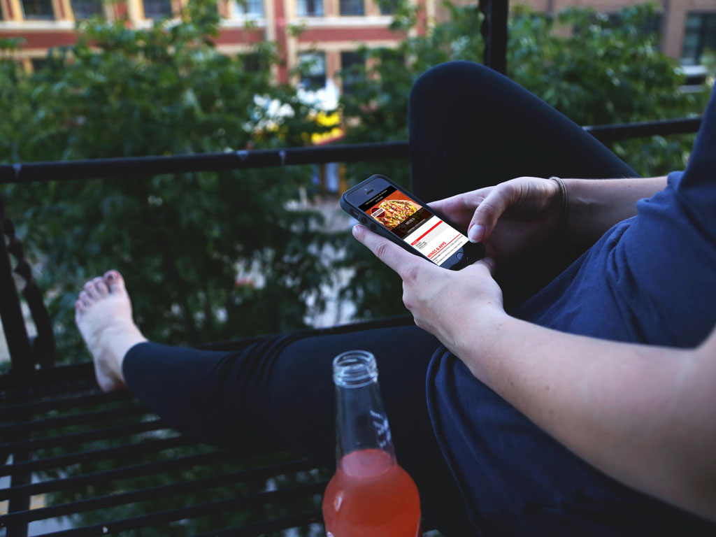 boot-menu-phone person holding smartphone