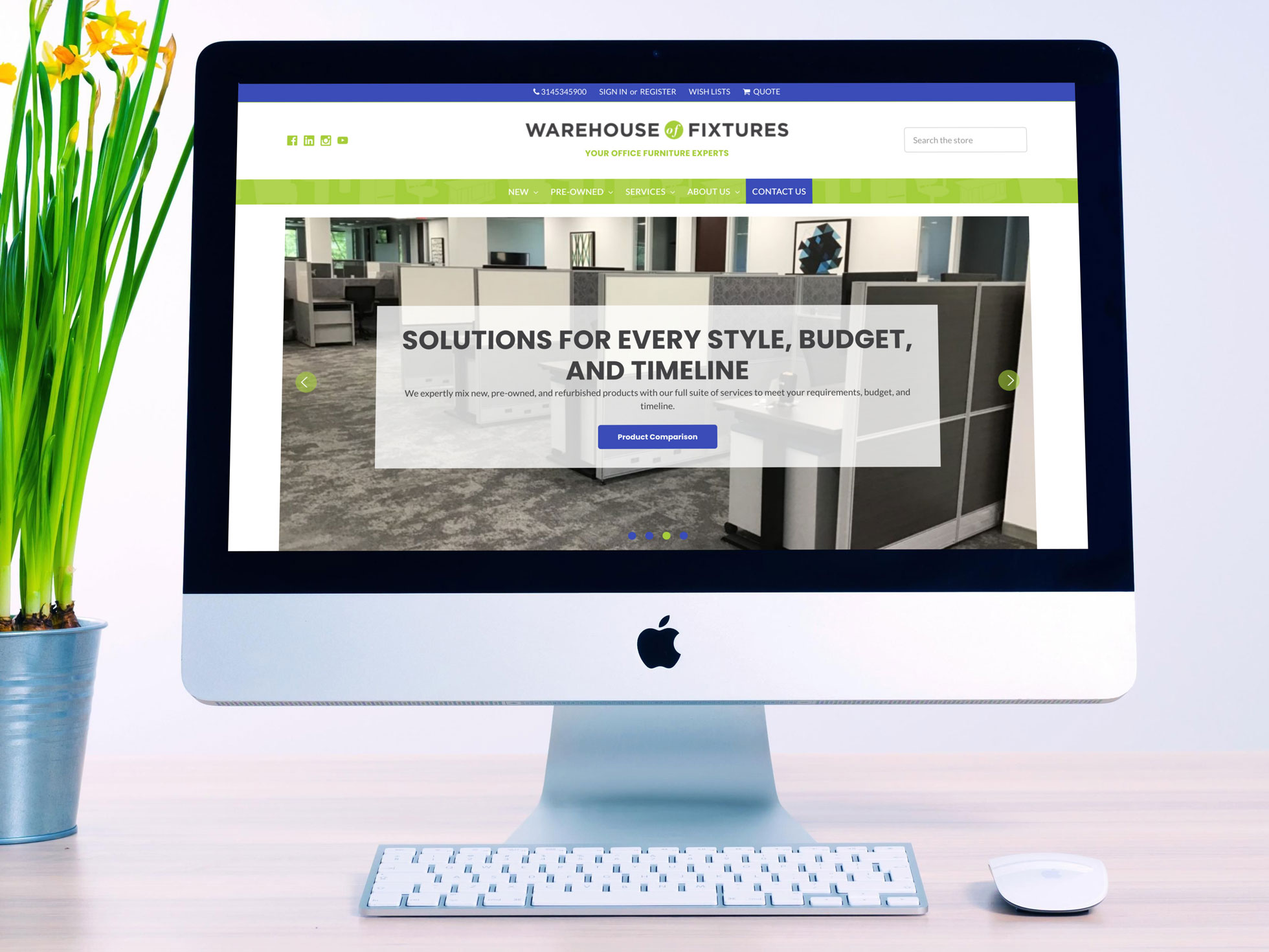 imac screen displaying warehouse fixtures website