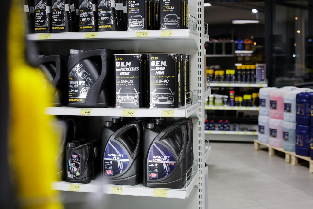 Shelves of automotive parts inside a parts store, representing the shift from marketplace-only selling to an omnichannel auto parts retail strategy