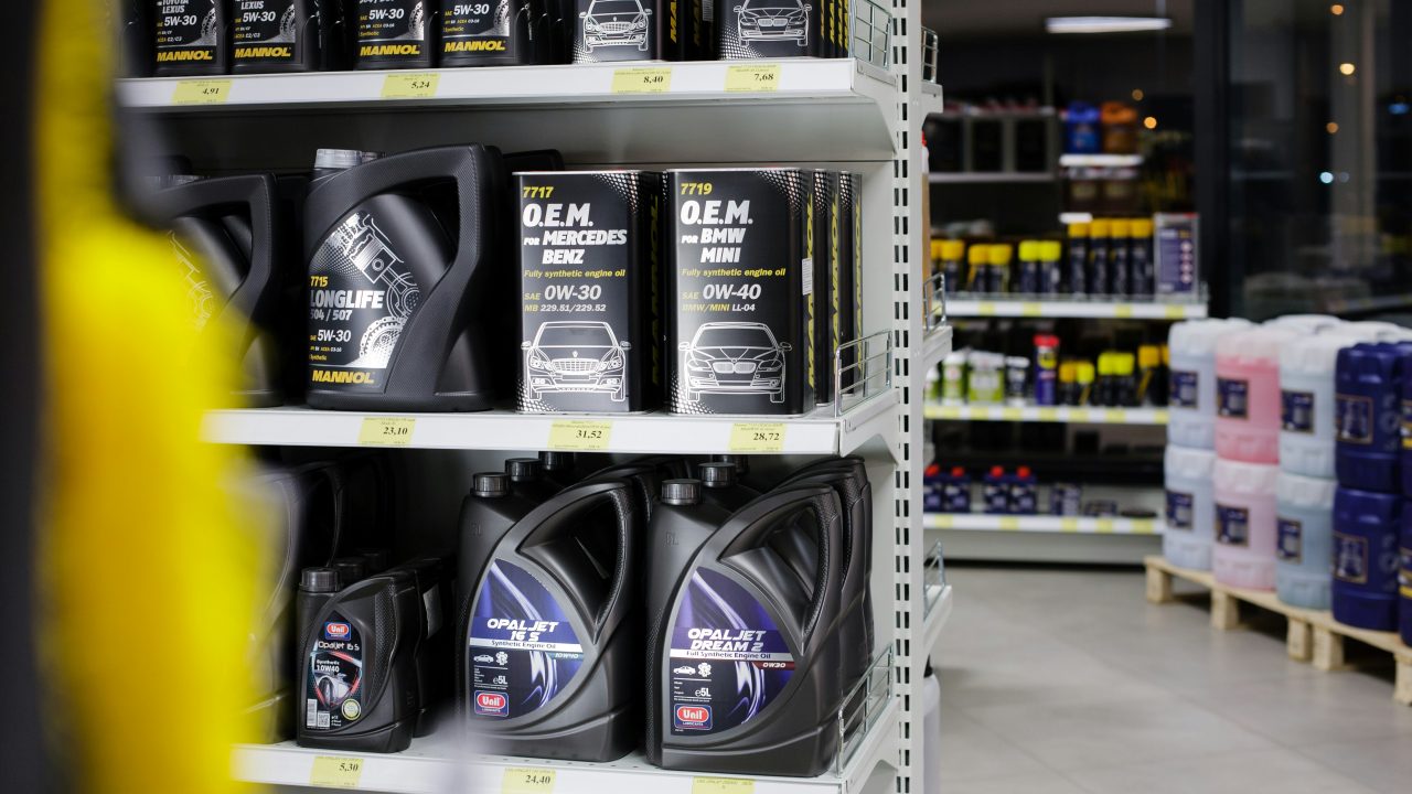 Shelves of automotive parts inside a parts store, representing the shift from marketplace-only selling to an omnichannel auto parts retail strategy