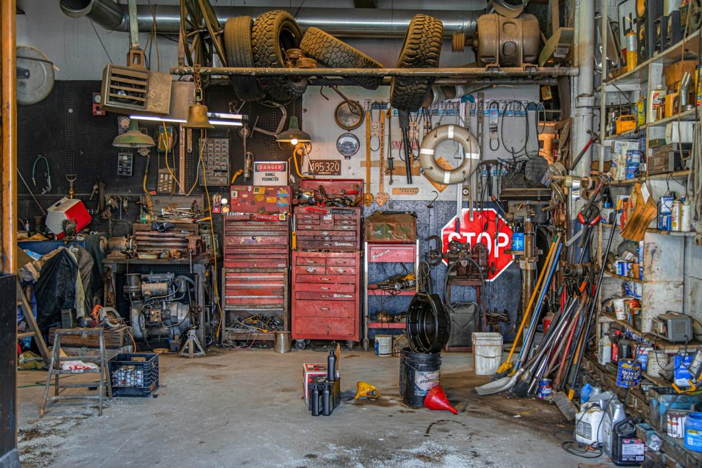 Close-up of auto parts and mechanic's tools, representing an auto parts loyalty and rewards program for repeat buyers