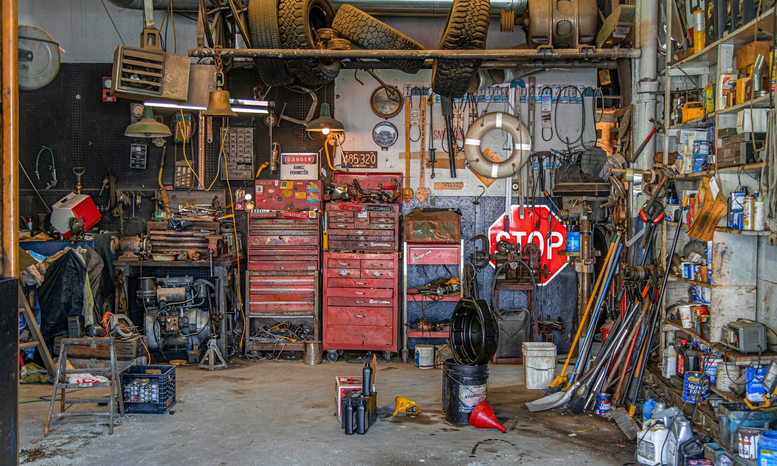 Close-up of auto parts and mechanic's tools, representing an auto parts loyalty and rewards program for repeat buyers